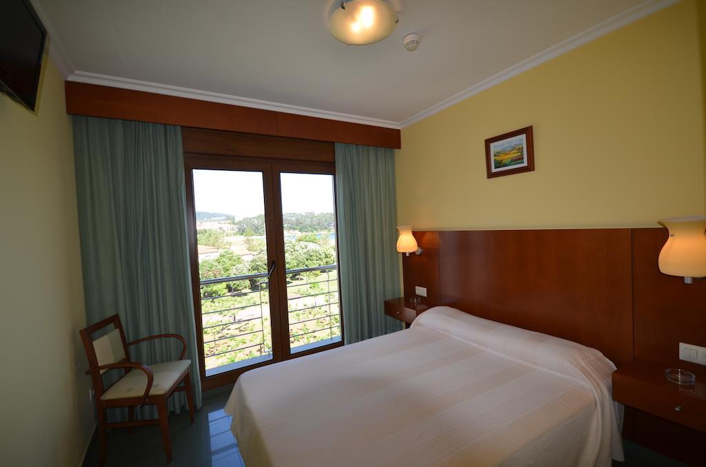 Hotel Maracaibo Portonovo Szoba fotó